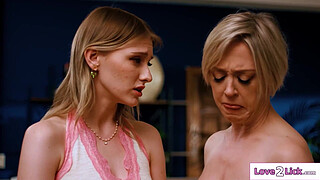 Big tits cougar stepmom tongues her teen stepdaughters pussy