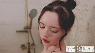 MY18TEENS - Petite babe with a perfect skinny body teasing her pussy in the shower