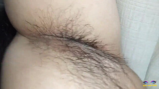 beautiful lady laying on bed in red penty with beautiful natural big tits