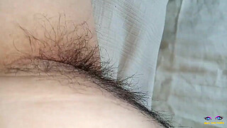 beautiful lady laying on bed in red penty with beautiful natural big tits