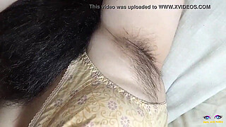 beautiful lady laying on bed in red penty with beautiful natural big tits