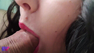 Sensual and detailed blowjob with red lips, close-up