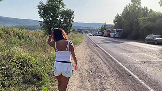 MILF blowjob chick Alina Tumanova sucks on the highway with passing cars