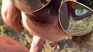 MILF blowjob chick Alina Tumanova sucks on the highway with passing cars