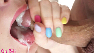 Sucking cock close-up, cum on tongue