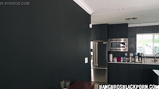 Ebony teen sucks her boyfriend right next to her without him noticing