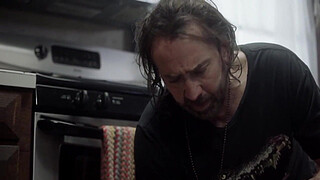 Penelope Mitchell with Nicolas Cage in "Between Worlds"