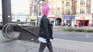 Beautiful and very slutty whore shows her butt in public while pissing between her legs