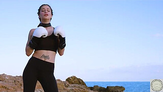 Boxer tied up and spanked before rimming her dom along the Balearic Sea -- beginning of a real domination session based on warrior themes in mythology