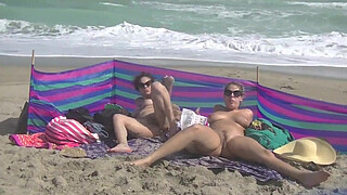 Exhibitionist Wife 484 Part 5 - Mrs Ginary and Mrs Nikki Brooks Teasing Nude Beach Voyeur! Spreading legs and teasing cocks in public!