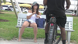 Upskirt Wife 27 - Heather Silk flashing her shaved pussy to voyeurs in public park!