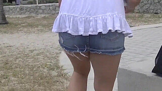 Upskirt Wife 27 - Heather Silk flashing her shaved pussy to voyeurs in public park!