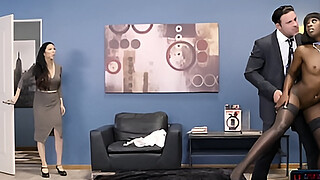 Black clothing store employee takes care of hard client