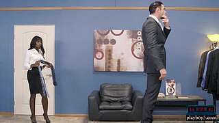 Black clothing store employee takes care of hard client