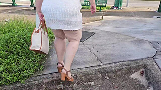 Mature hijab Milf masturbating with big dildo publicly outdoor at bus stop with cars passing by