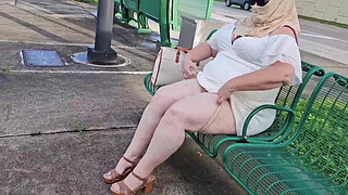 Mature hijab Milf masturbating with big dildo publicly outdoor at bus stop with cars passing by