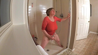 60 GILF masturbating in wet t-shirt