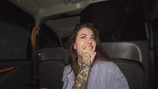 Fake Taxi Jess Mori is covered in tattoos and fucked hard by a huge cock