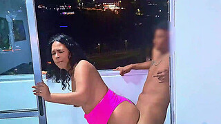 Latina whore fucking and sucking penis on a balcony overlooking the public street in Medellin, a wet blowjob and a frenetic fuck. While she is being fucked the cars pass by on the road. Venezuelan slut