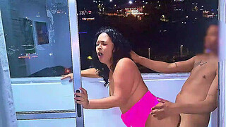 Latina whore fucking and sucking penis on a balcony overlooking the public street in Medellin, a wet blowjob and a frenetic fuck. While she is being fucked the cars pass by on the road. Venezuelan slut