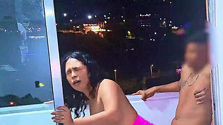 Latina whore fucking and sucking penis on a balcony overlooking the public street in Medellin, a wet blowjob and a frenetic fuck. While she is being fucked the cars pass by on the road. Venezuelan slut