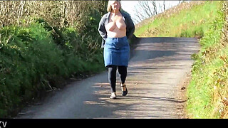 Boobies on display down a public lane