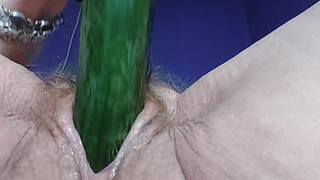 Granny fucks hairy pussy and butt with cucumber