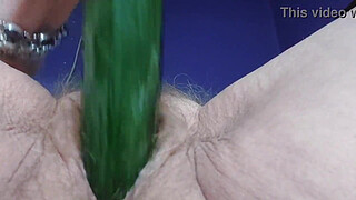 Granny fucks hairy pussy and butt with cucumber