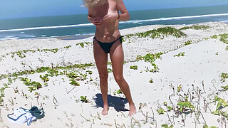 Anal insemination on a public beach