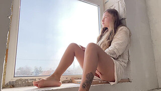 Public masturbation by the window, seducing passers-by.