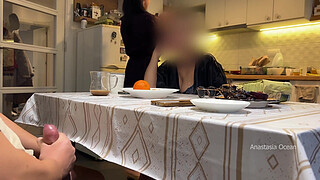 My husband jerking under a table front of my step mom and i right at the kitchen.