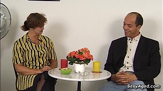 Busty amateur German mature lady Beatta jerking big dick to balding guy Gustavo Meunier while he toying her hairy pussy then he fucks her