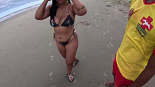 Naughty Nicoly seduces a fireman on the beach and sits on his cock in the middle of the woods