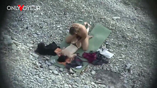 Beach Voyeur. Is fresh sperm good as a sunblock cream?