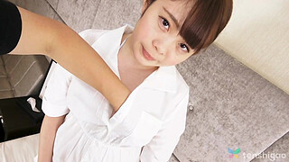 Cafe worker Yuko Mukai plays dressup in a uniform for us