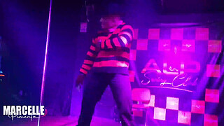 Group of girls having sex with stripper on nightclub stage