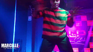 Group of girls having sex with stripper on nightclub stage