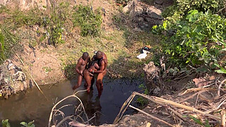 2 strangers taking turns to fuck this teenage village chick in the river