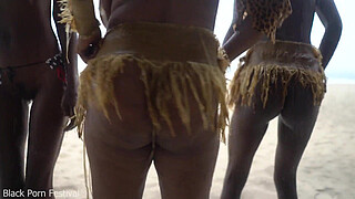 3 African tribe witches doing a dancing ritual for making rain