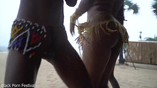 3 African tribe witches doing a dancing ritual for making rain