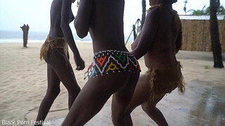 3 African tribe witches doing a dancing ritual for making rain