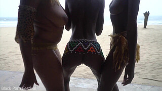 3 African tribe witches doing a dancing ritual for making rain