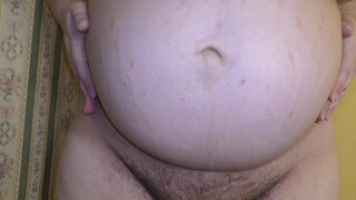 Cheating wife with a big pregnant belly having sex with her lover in doggystyle position