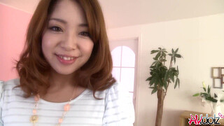 Naughty Japanese chick Mirei Oomori rubs her hairy pussy,uncensored.