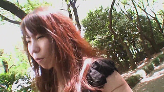 Pretty Asian brunette Rie Obata kneads her hairy pussy with a vibrator